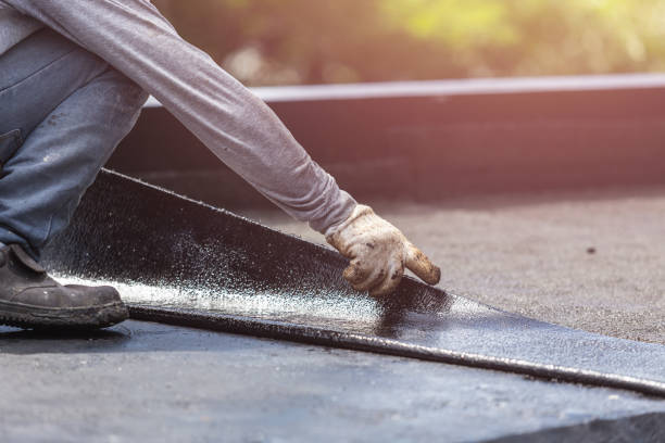 Professional Basement Waterproofing technician working in Monument Beach, MA